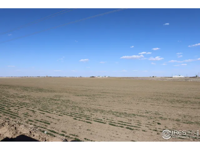 a view of an ocean and a yard