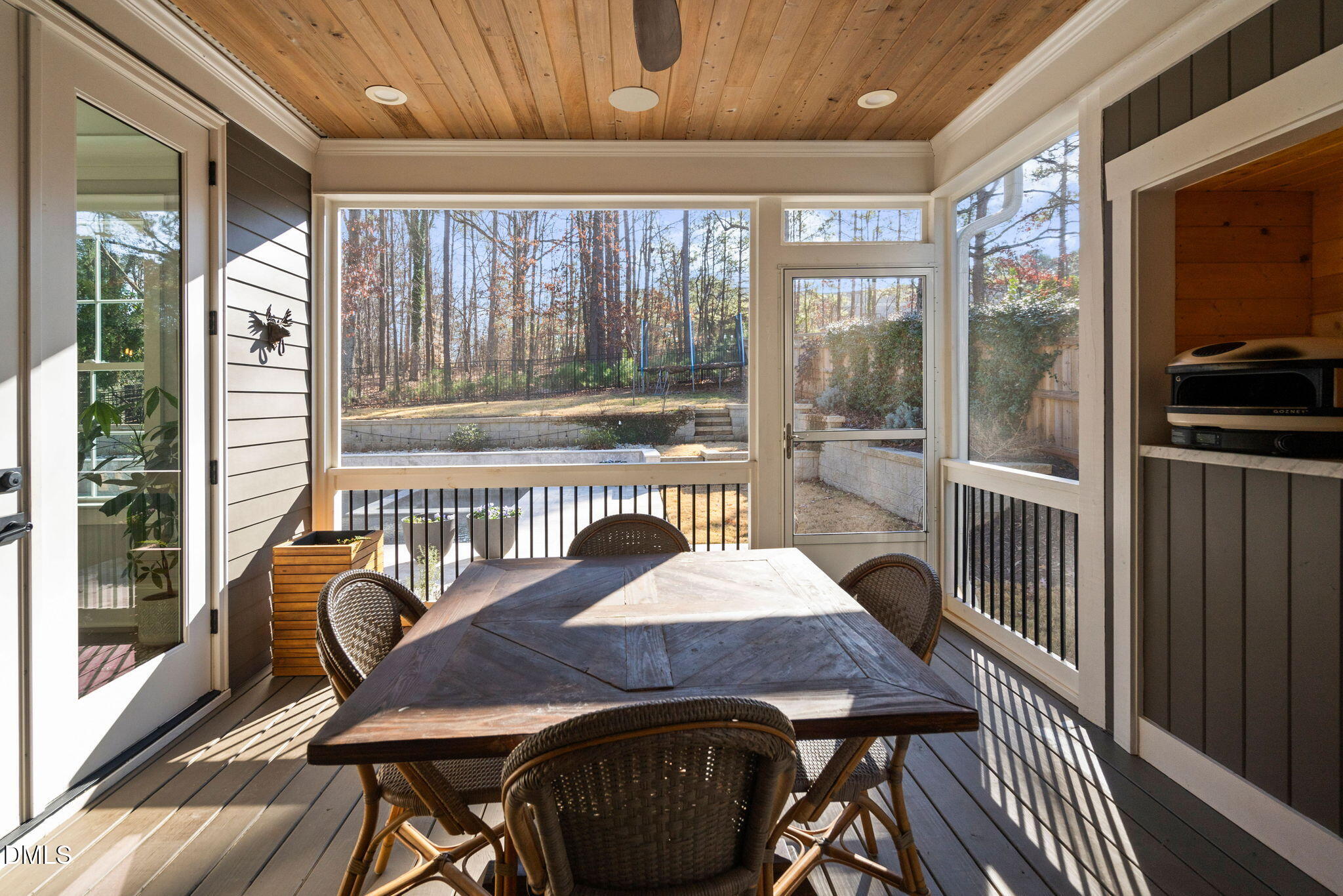 3417 Edgemont Drive Raleigh, NC 27612 - Photo 82 of 83 a view of a dining room with furniture window and wooden floor