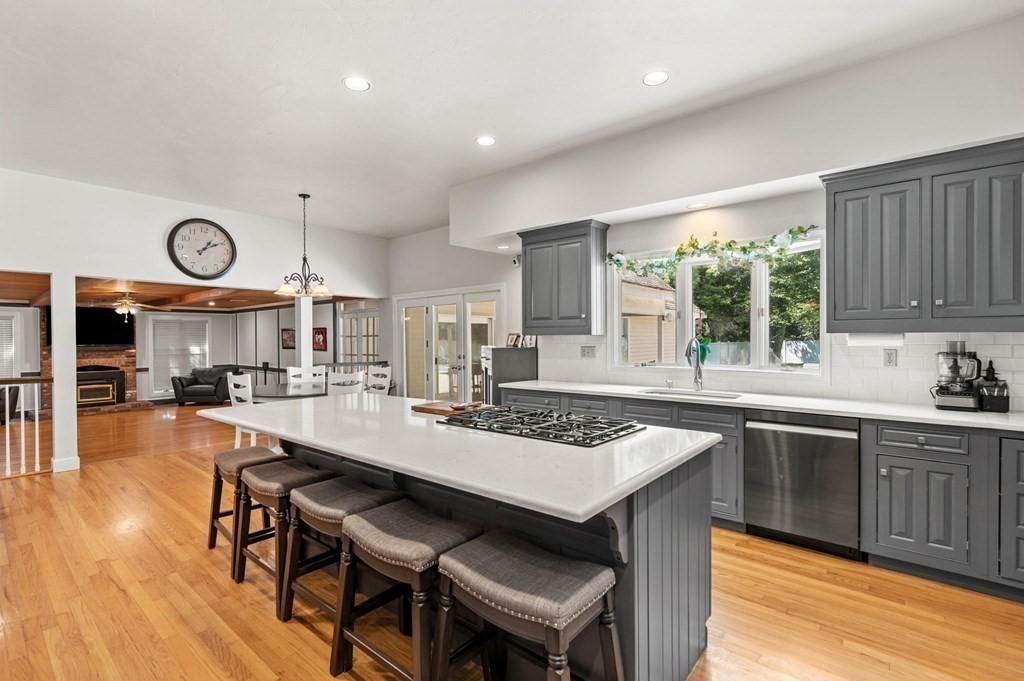 a kitchen with a table and chairs in it