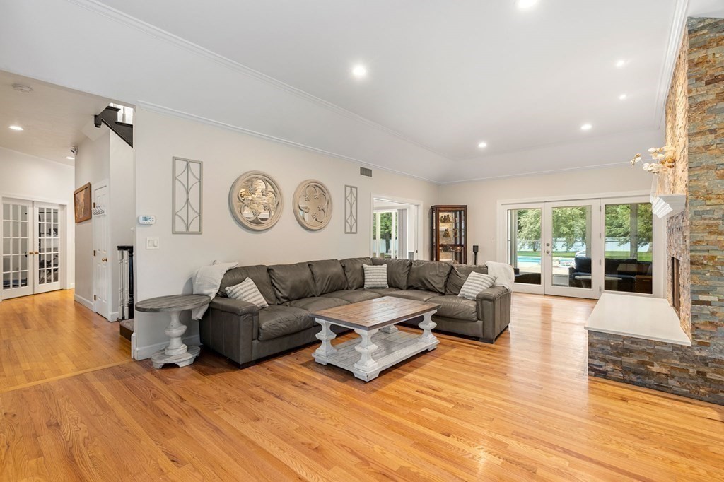 3 Burnham Lane Danvers, MA 01923 - Photo 12 of 41 a living room with furniture and a large window