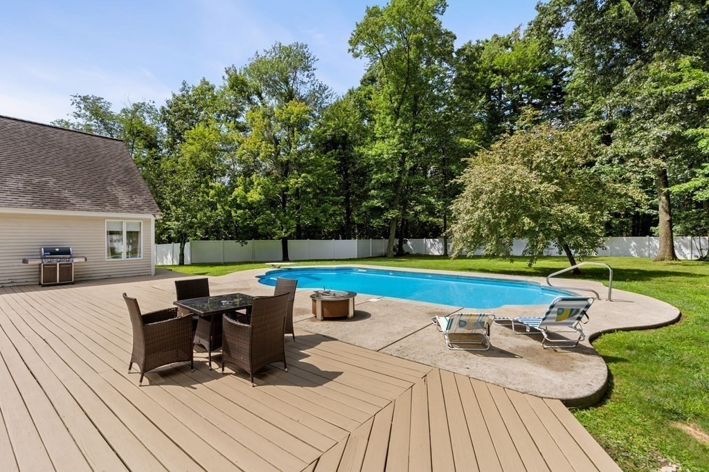 3 Burnham Lane Danvers, MA 01923 - Photo 25 of 41 a view of backyard with swimming pool and seating space