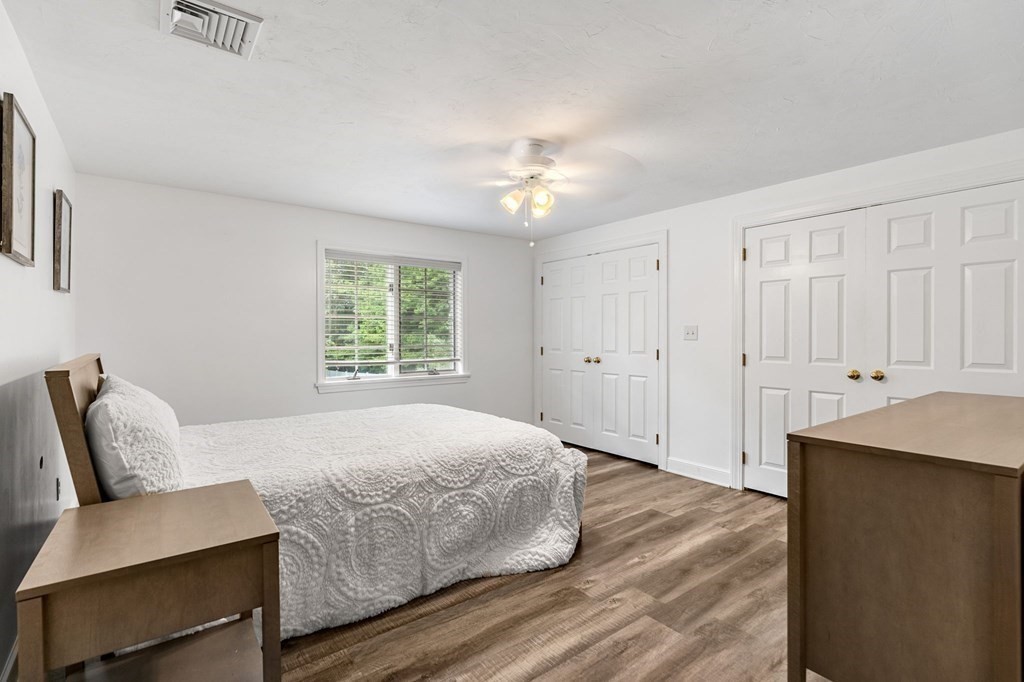 3 Burnham Lane Danvers, MA 01923 - Photo 31 of 41 a bedroom with a bed and a couch