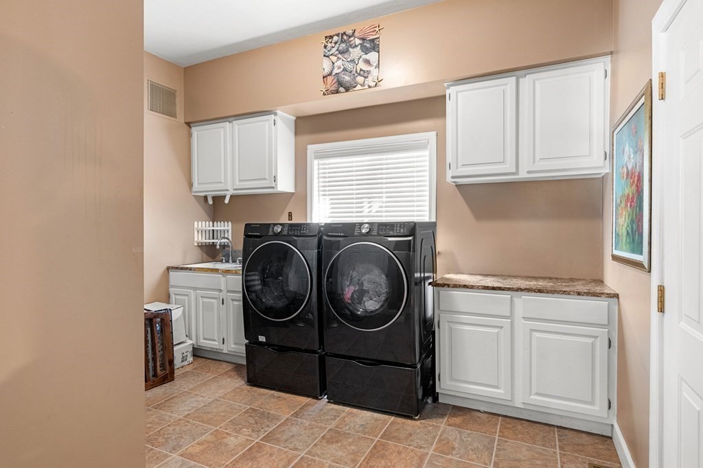 3 Burnham Lane Danvers, MA 01923 - Photo 37 of 41 a utility room with sink dryer and washer