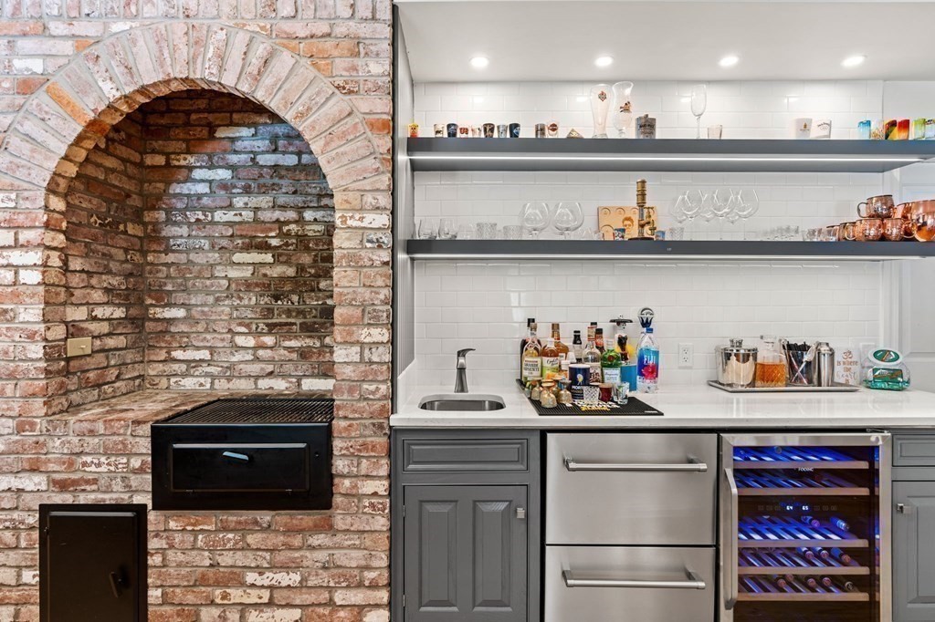 3 Burnham Lane Danvers, MA 01923 - Photo 6 of 41 a kitchen with a sink and cabinets