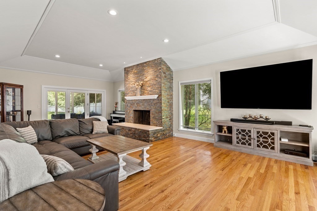 3 Burnham Lane Danvers, MA 01923 - Photo 9 of 41 a living room with furniture and a flat screen tv