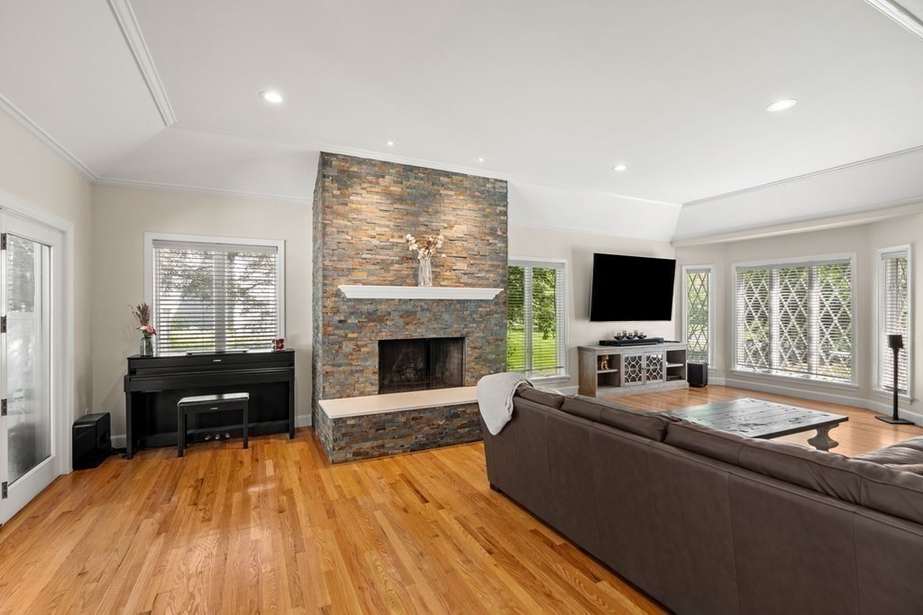 3 Burnham Lane Danvers, MA 01923 - Photo 10 of 41 a living room with furniture and a flat screen tv
