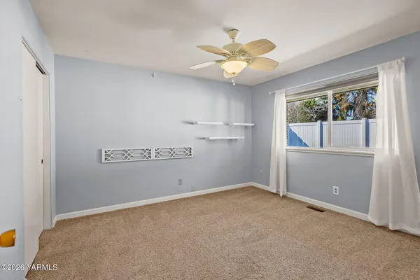 a kitchen with stainless steel appliances kitchen island a cabinets and wooden floor