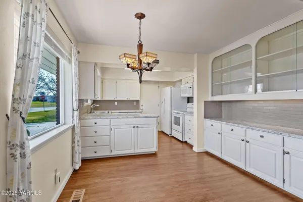 a room with cabinets and window