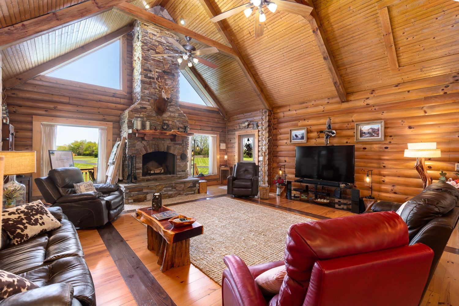 6326 Arno Road Franklin, TN 37064 - Photo 15 of 67 a living room with furniture a flat screen tv and a fireplace