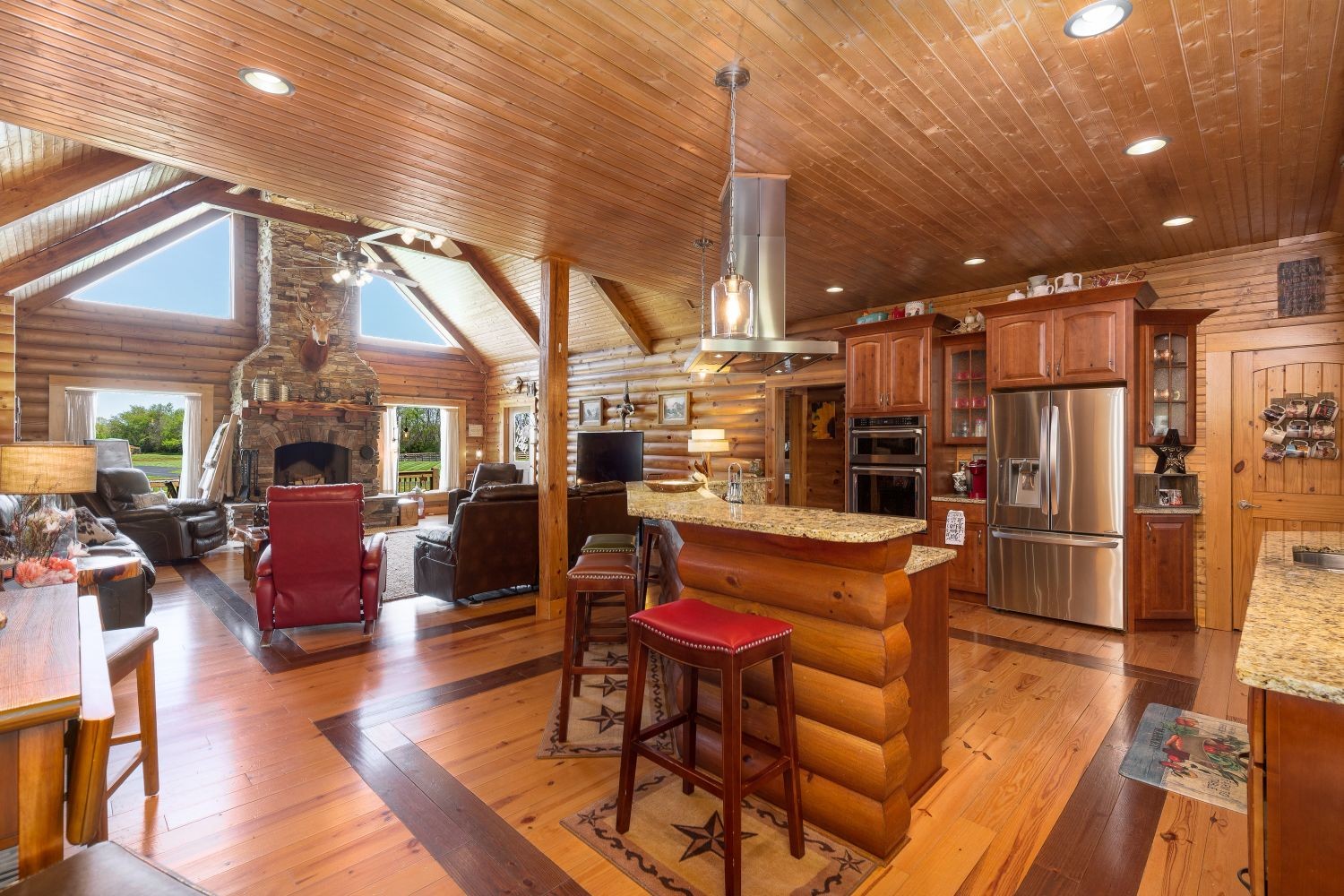 6326 Arno Road Franklin, TN 37064 - Photo 49 of 67 a living room with stainless steel appliances furniture a rug and a view of kitchen