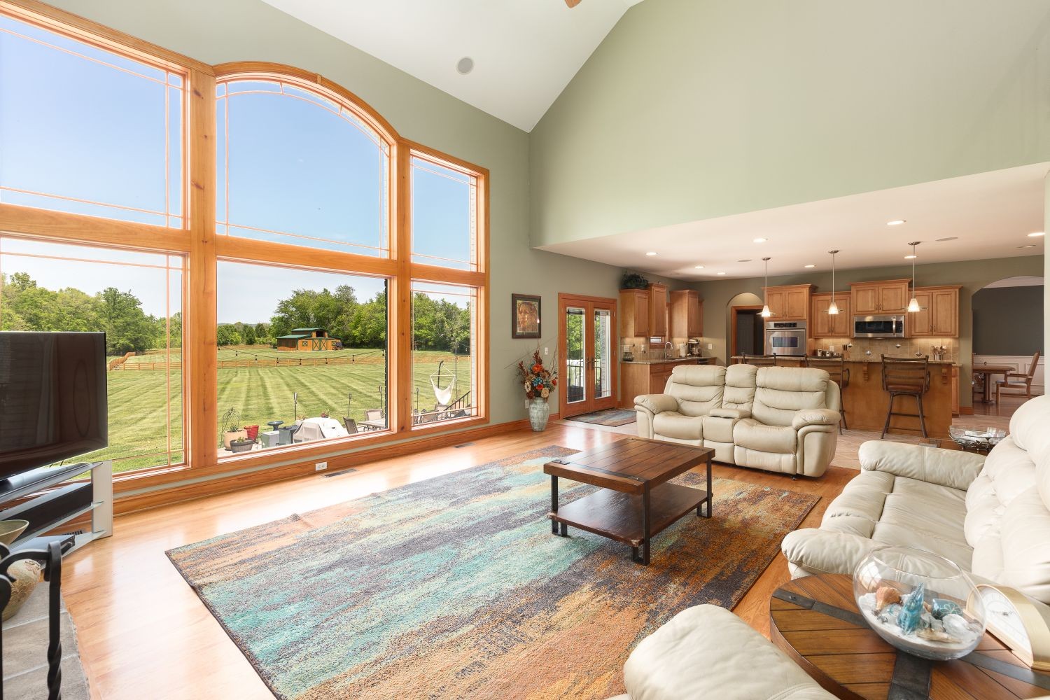 6326 Arno Road Franklin, TN 37064 - Photo 6 of 67 a living room with furniture and a floor to ceiling window
