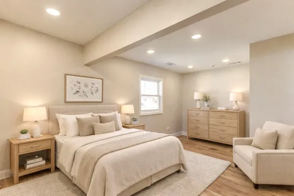 a bedroom with a bed and furniture