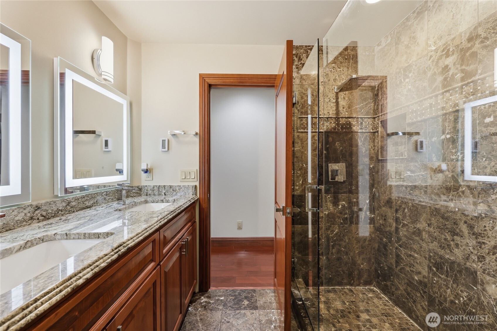 1411 Thorndyke Road Port Ludlow, WA 98365 - Photo 38 of 40 a bathroom with a granite countertop shower sink and mirror