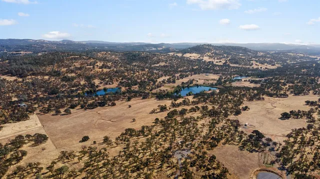 an aerial view of beach and ocean