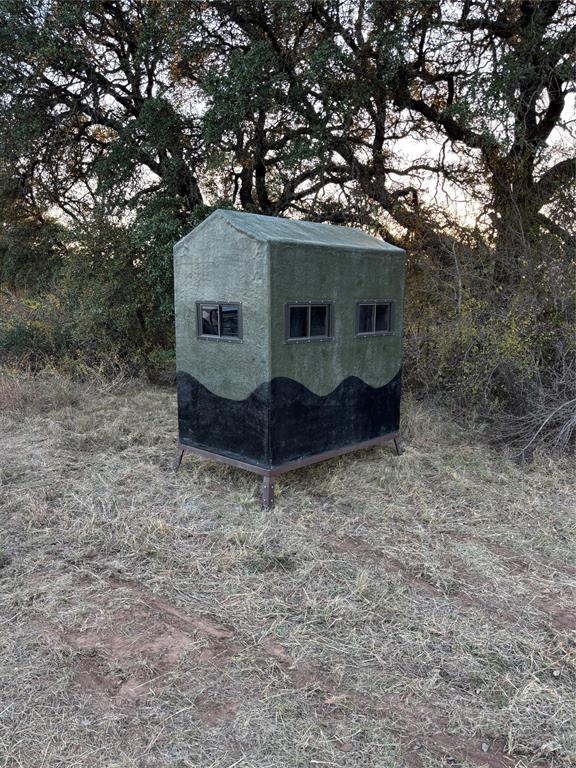 1868 Highway 84 Zephyr, TX 76890 - Photo 40 of 40 a house with trees in the background