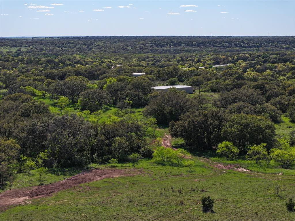 1868 Highway 84 Zephyr, TX 76890 - Photo 4 of 40 an aerial view of residential houses with outdoor space