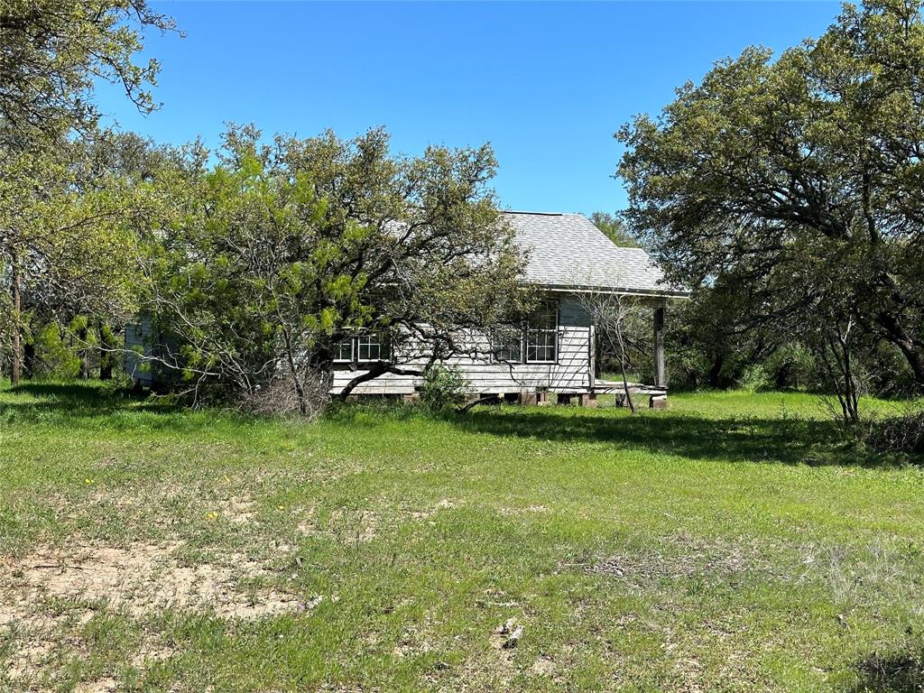 1868 Highway 84 Zephyr, TX 76890 - Photo 7 of 40 a house view with a garden space