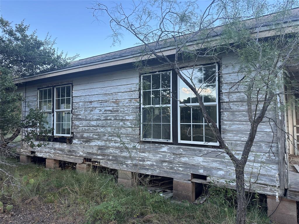 1868 Highway 84 Zephyr, TX 76890 - Photo 9 of 40 a backyard of a house with lots of green space