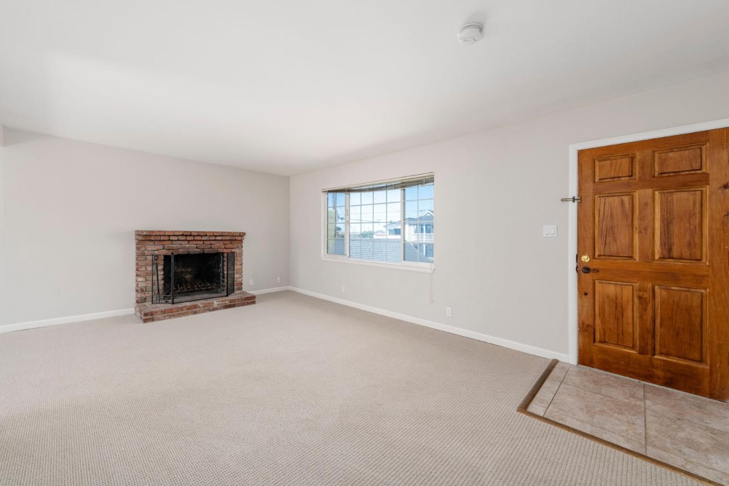 168 Salada Avenue Pacifica, CA 94044 - Photo 4 of 12 an empty room with windows