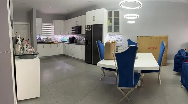 a living room with furniture and a couch