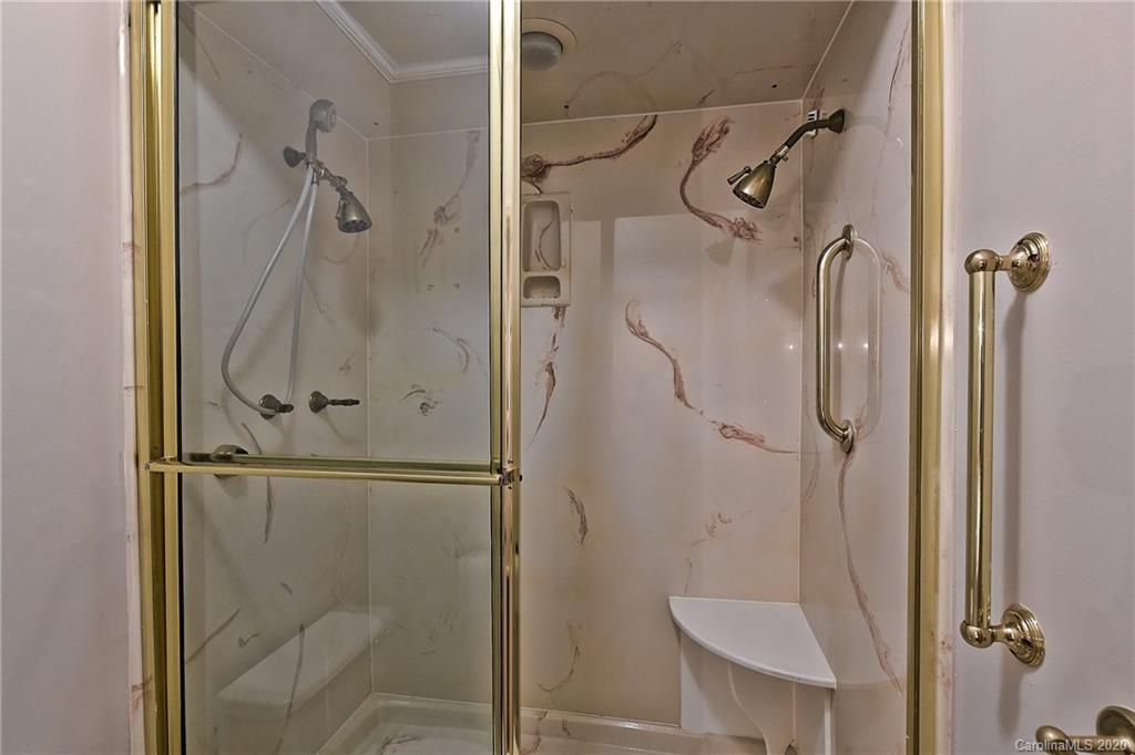 908 Cherokee Road, Unit 908 Charlotte, NC 28207 - Photo 28 of 35 a bathroom that has a shower