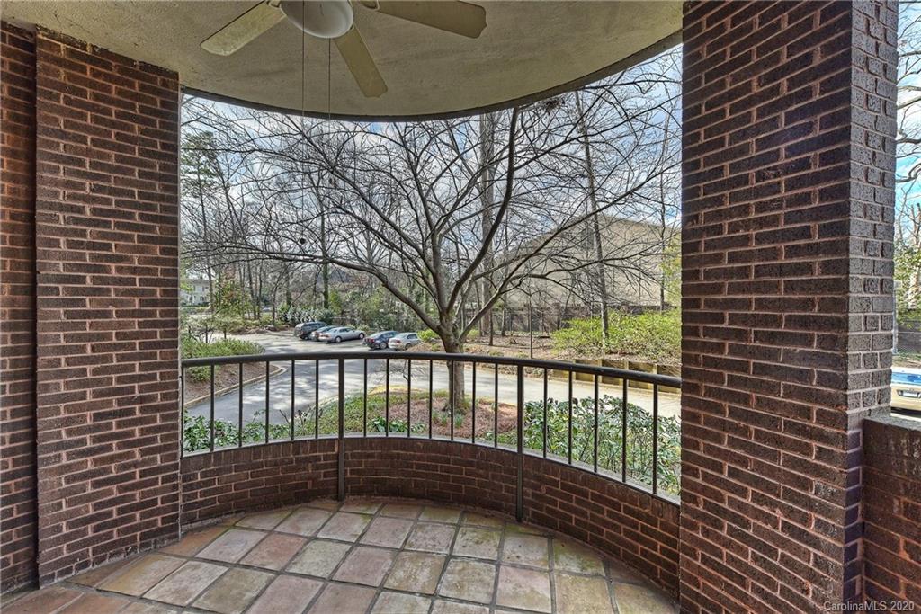 908 Cherokee Road, Unit 908 Charlotte, NC 28207 - Photo 33 of 35 a view of a porch with a backyard