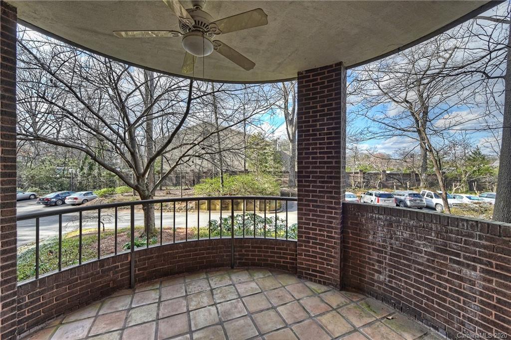 908 Cherokee Road, Unit 908 Charlotte, NC 28207 - Photo 35 of 35 a view of a balcony with trees