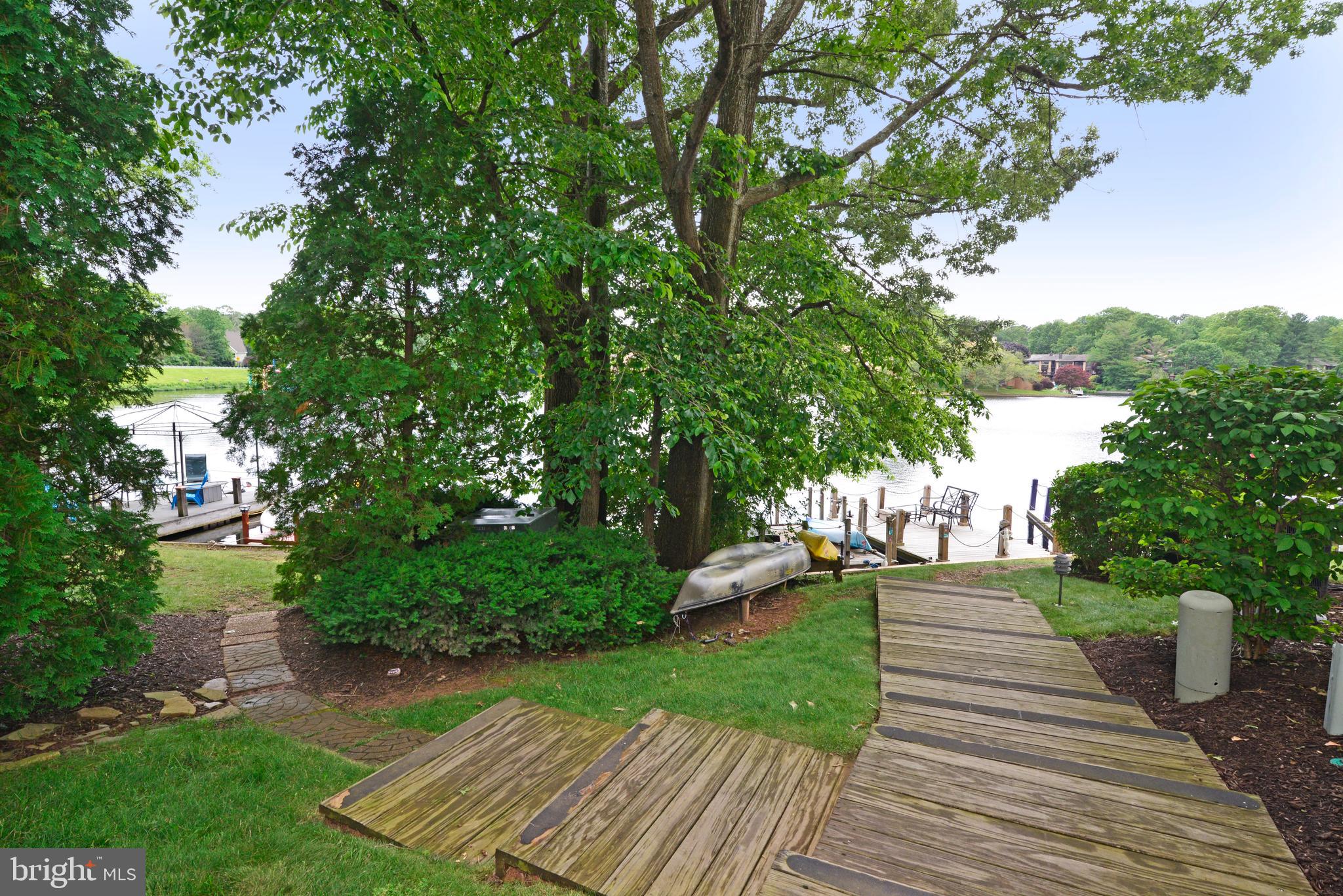 11128 Harbor Court Reston, VA 20191 - Photo 33 of 44 Steps lead to the dock and shoreline.