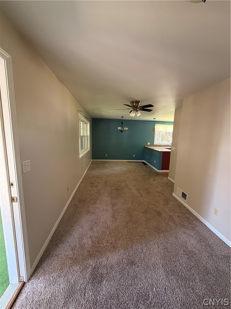 311 Sayles Street Oneida, NY 13421 - Photo 5 of 25 Living room facing dining room