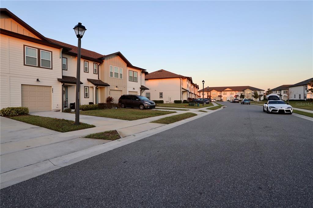 943 Conch Road Davenport, FL 33896 - Photo 31 of 42 a view of multiple houses with a street