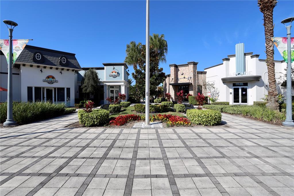 943 Conch Road Davenport, FL 33896 - Photo 41 of 42 a view of a building with potted plants