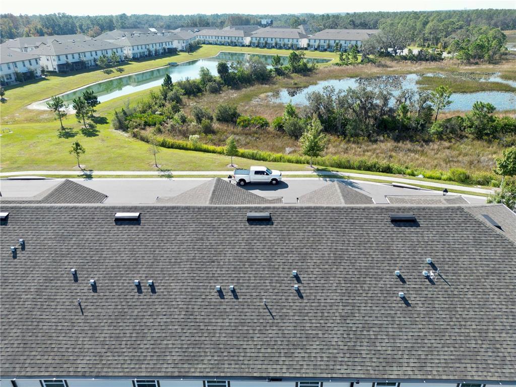 943 Conch Road Davenport, FL 33896 - Photo 5 of 43 an aerial view of a house with a lake view