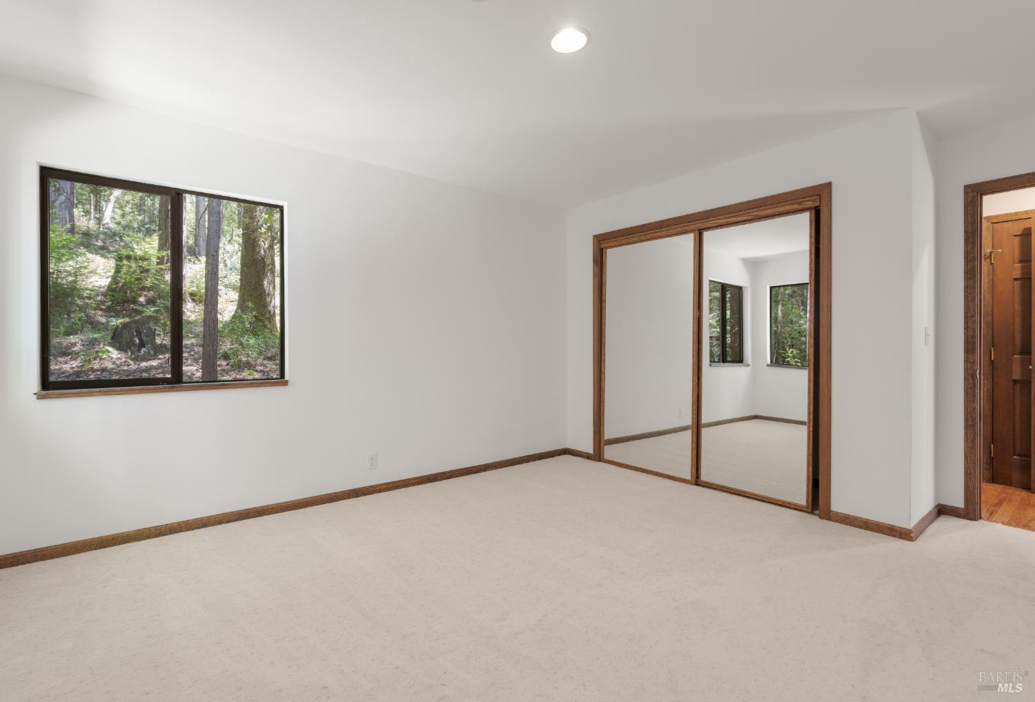 355 Chinquapin Lane The Sea Ranch, CA 95497 - Photo 15 of 31 an empty room with windows and entrance