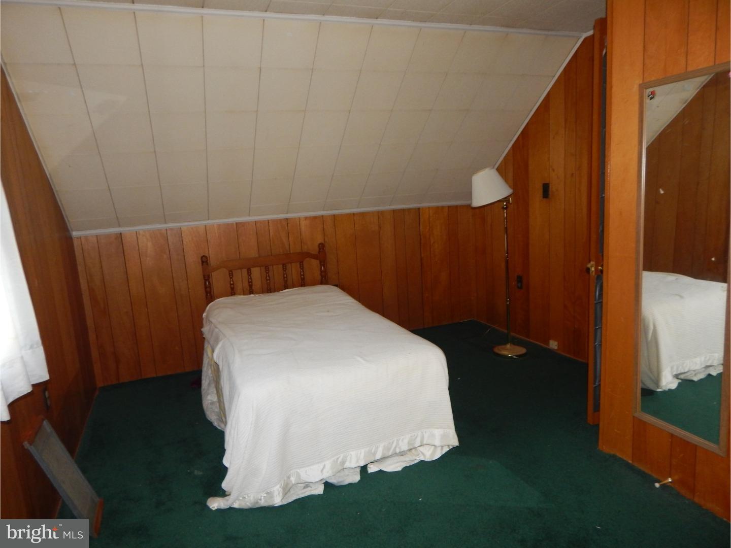 25 Downing Road Hamilton, NJ 08690 - Photo 12 of 14 a bed in a room next to a window