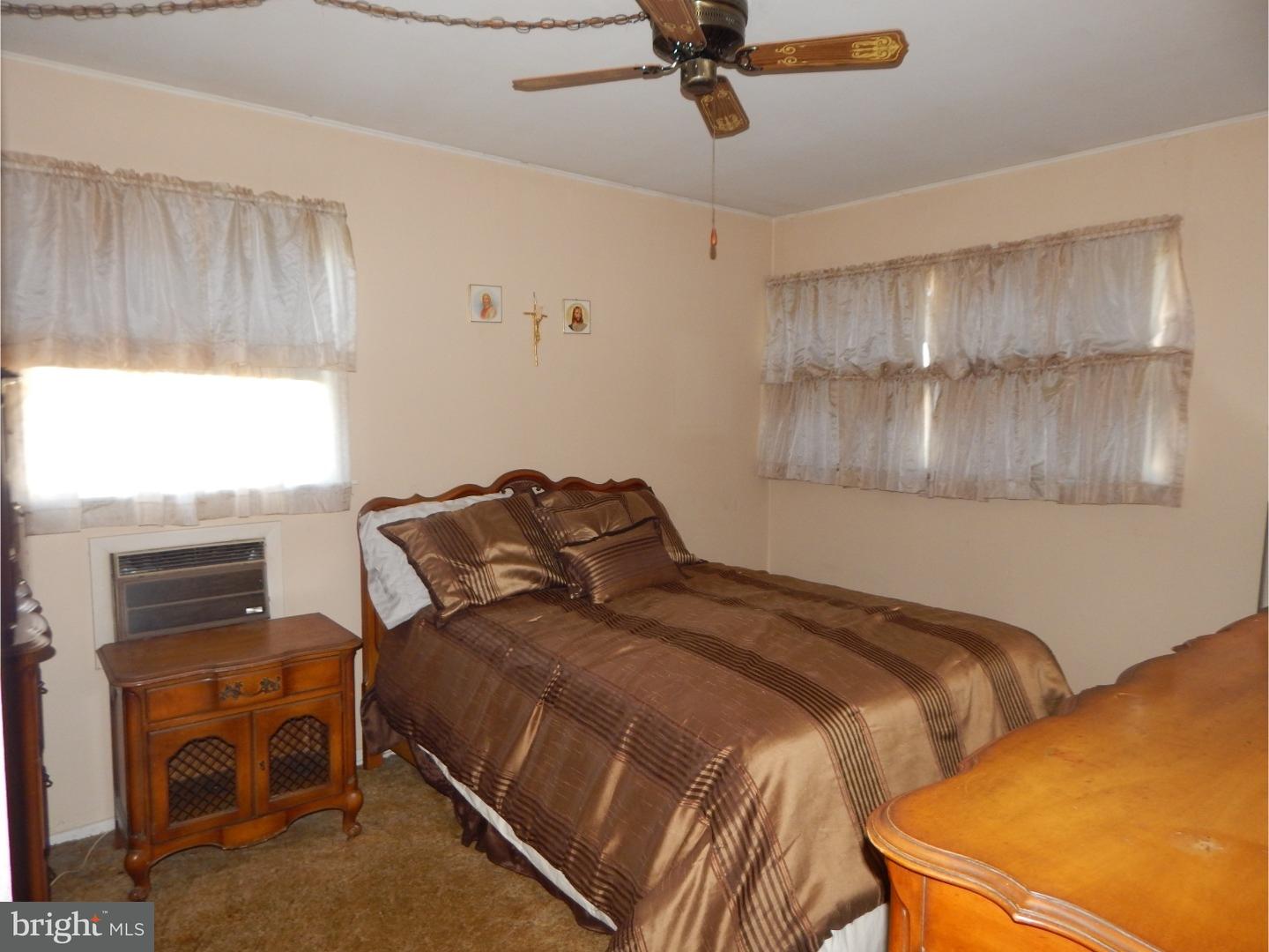 25 Downing Road Hamilton, NJ 08690 - Photo 7 of 14 a bedroom with two beds and a window