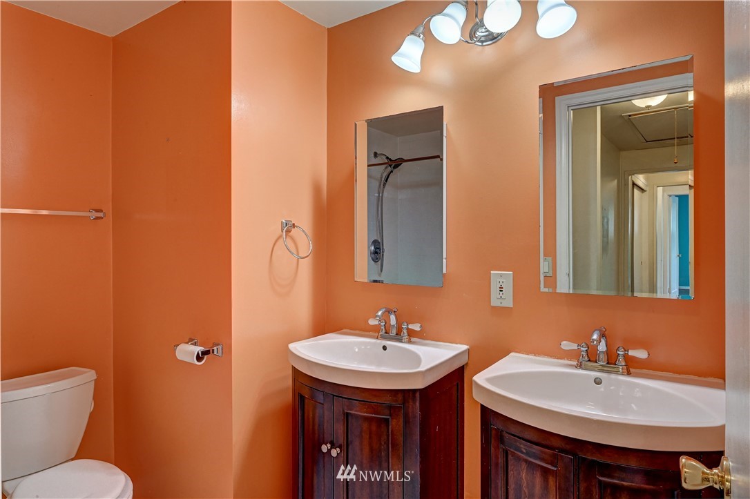 3232 Southeast 5th Street Renton, WA 98058 - Photo 15 of 20 a bathroom with a sink and a mirror