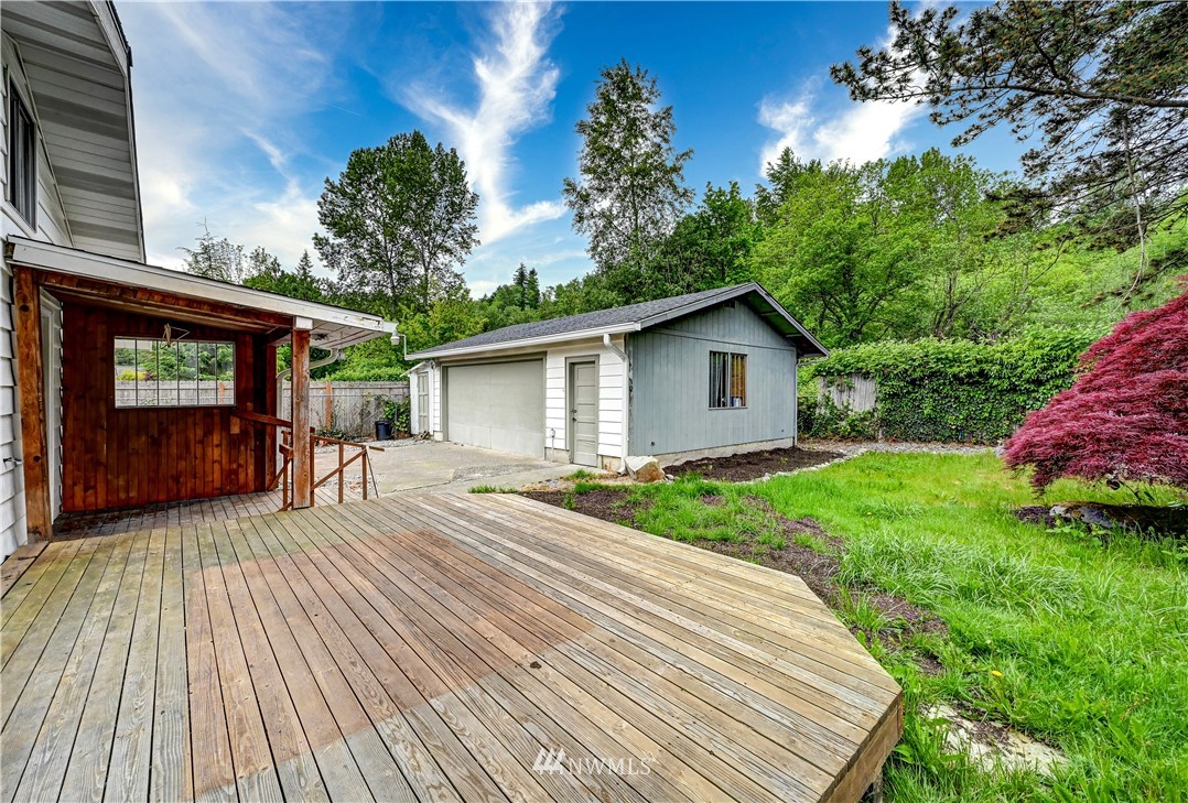 3232 Southeast 5th Street Renton, WA 98058 - Photo 18 of 20 a house with yard in front of it