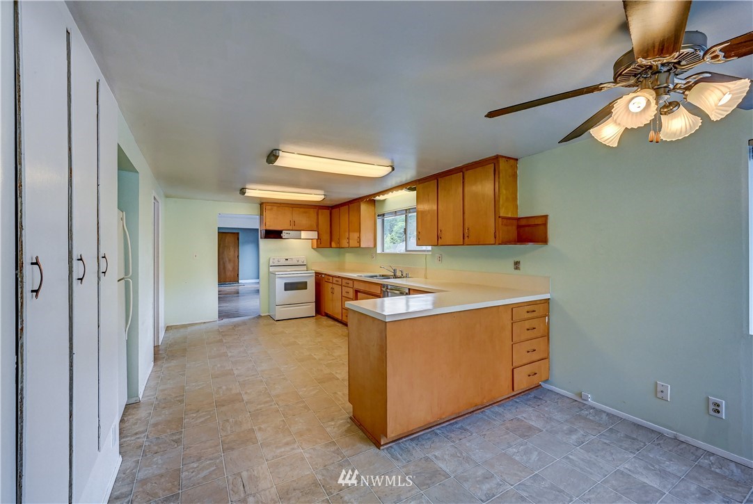 3232 Southeast 5th Street Renton, WA 98058 - Photo 7 of 20 a view of a kitchen with a sink