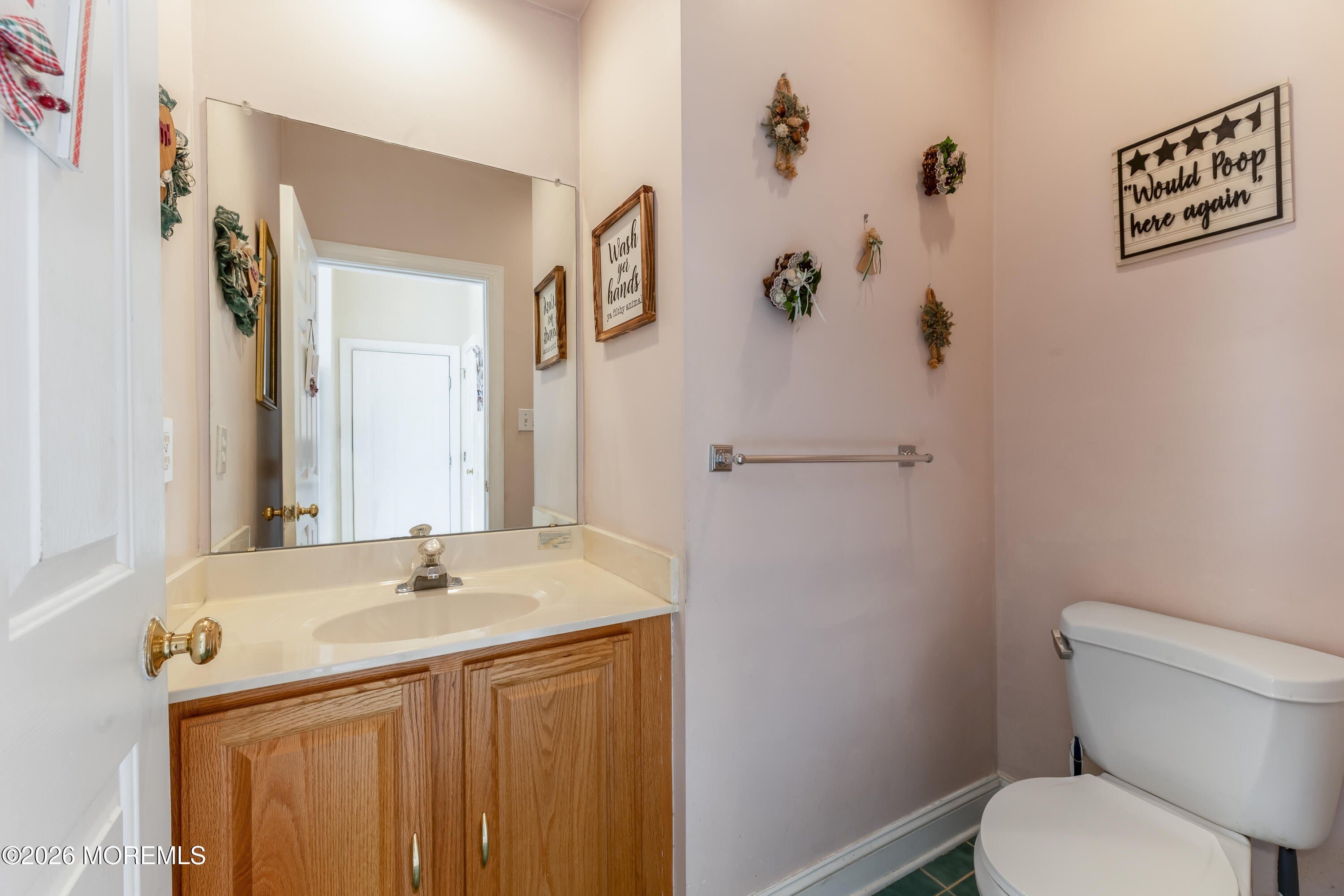 58 Danella Way Howell, NJ 07731 - Photo 18 of 46 a bathroom with a sink a toilet and shower