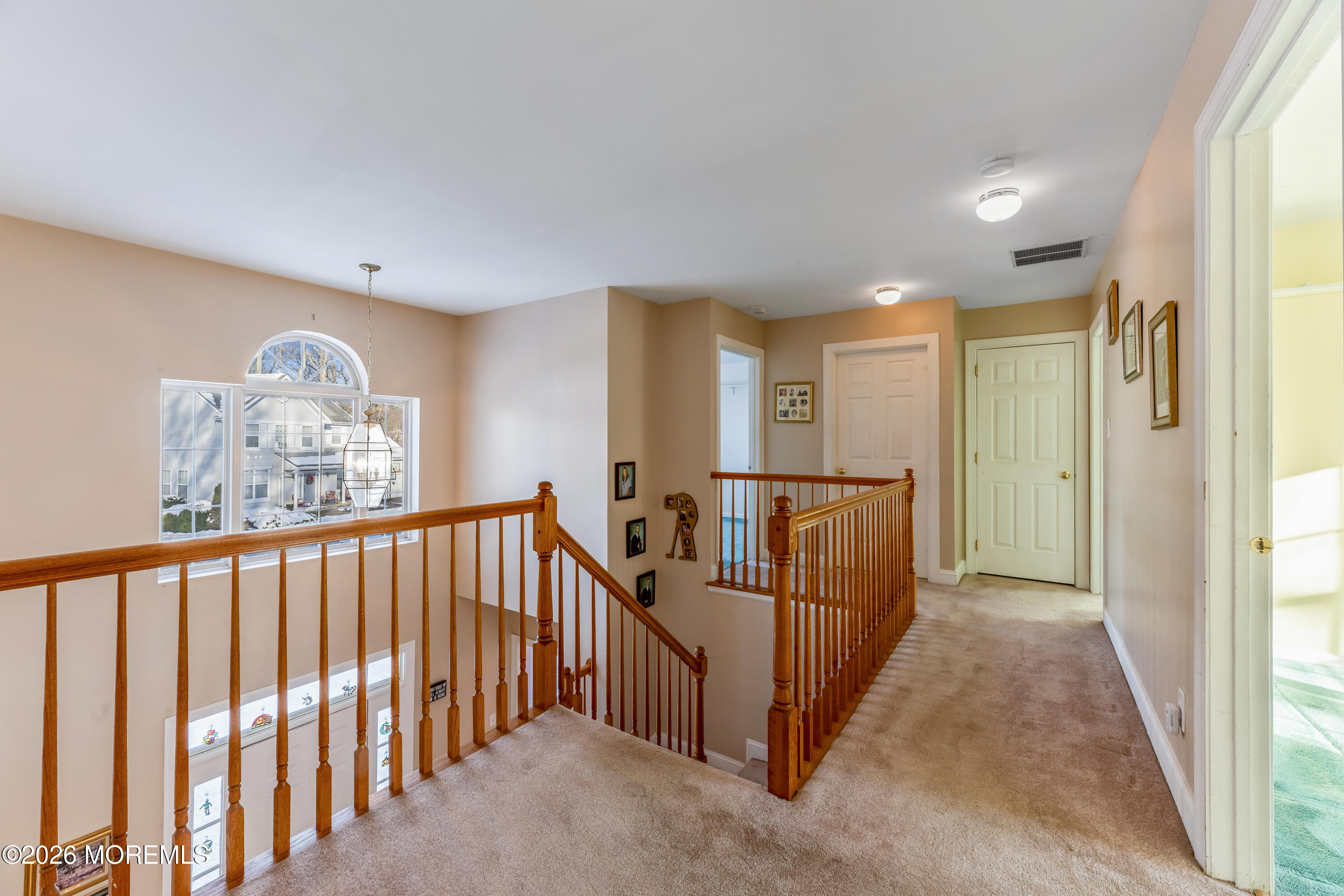 58 Danella Way Howell, NJ 07731 - Photo 19 of 46 a view of hallway with stairs