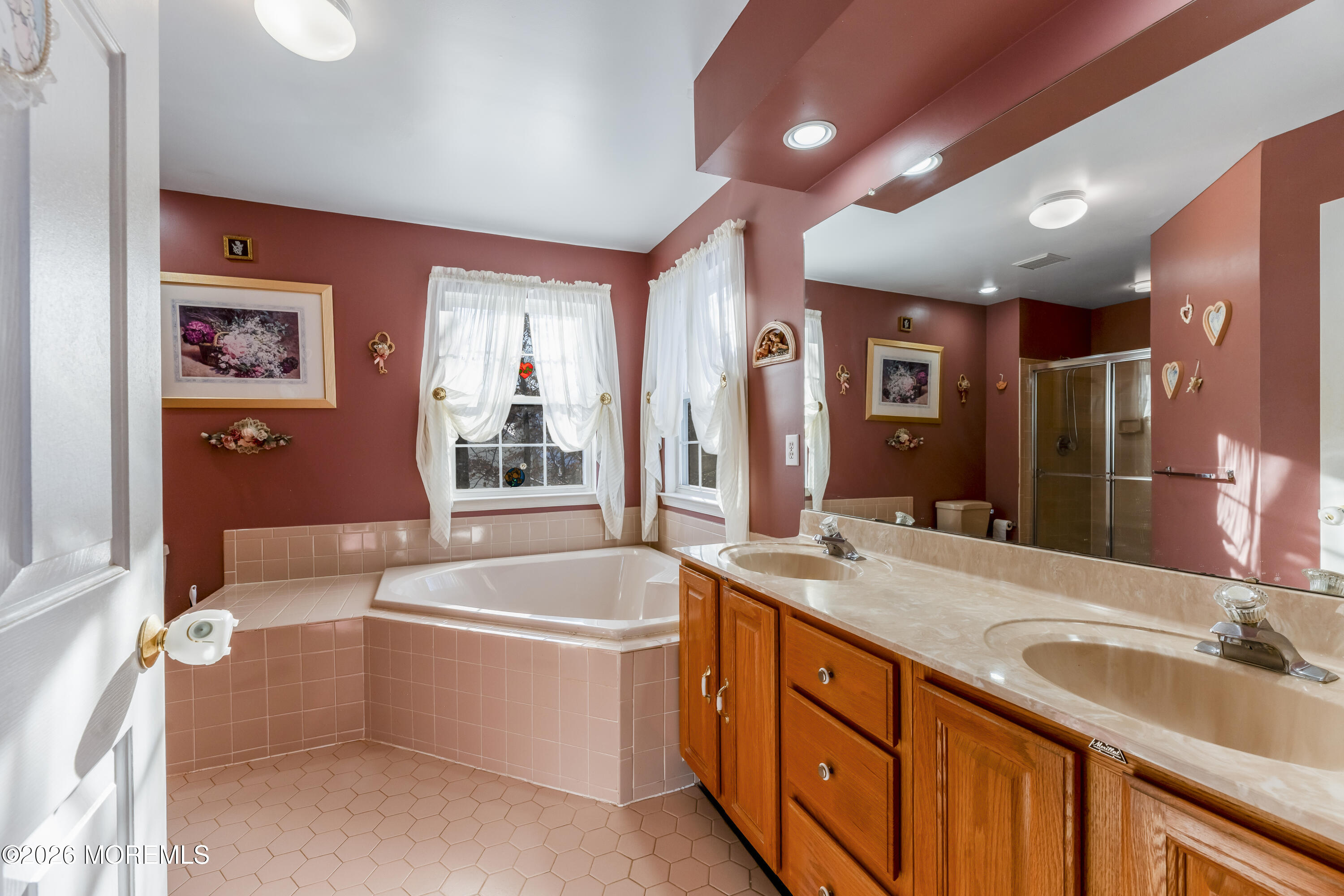 58 Danella Way Howell, NJ 07731 - Photo 22 of 46 a bathroom with a granite countertop tub sink and mirror