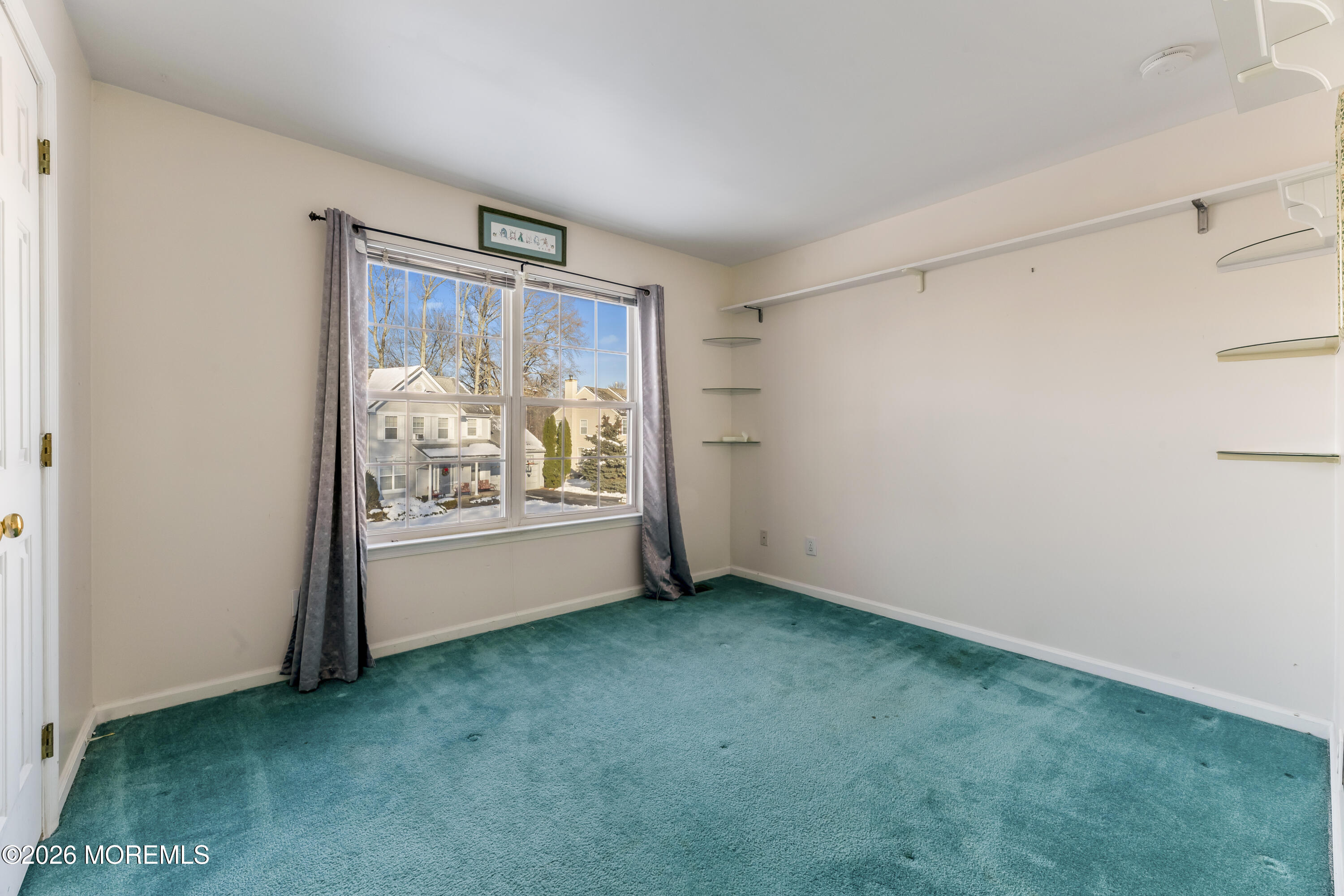 58 Danella Way Howell, NJ 07731 - Photo 27 of 46 wooden floor in an empty room with a window