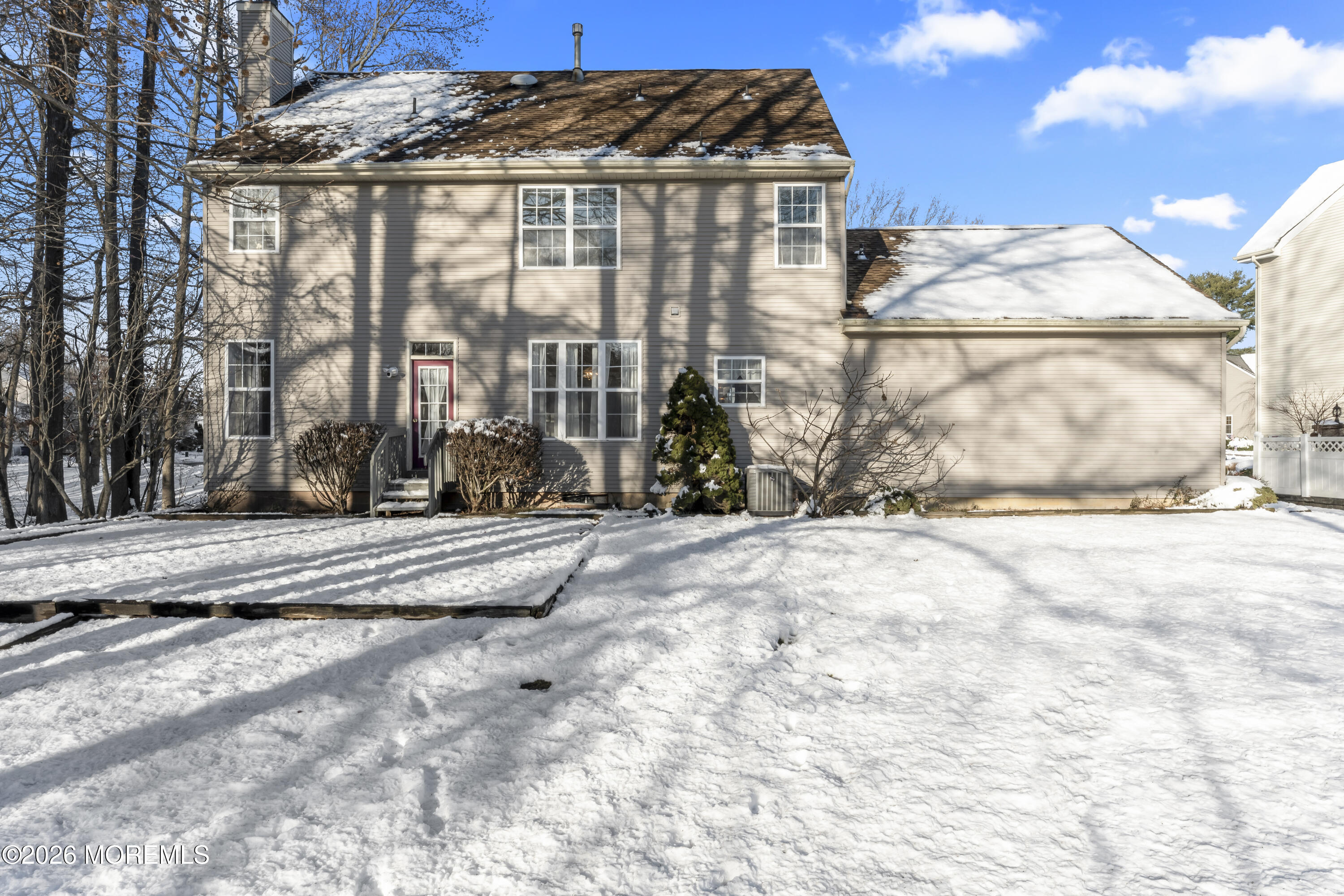 58 Danella Way Howell, NJ 07731 - Photo 33 of 46 a view of a street with a building in the background