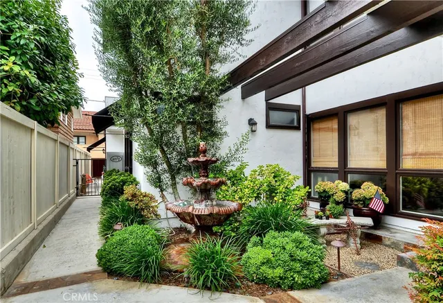 a view of a backyard with garden