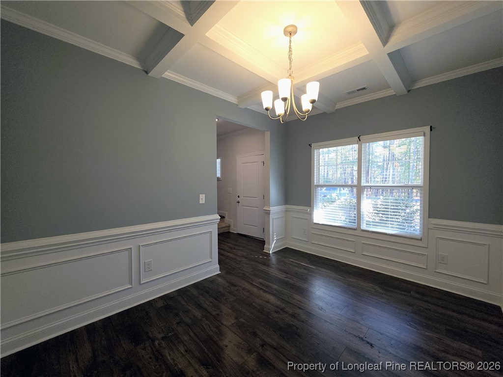 7850 Rufus Johnson Road Fayetteville, NC 28306 - Photo 9 of 25 wooden floor in an empty room with a window