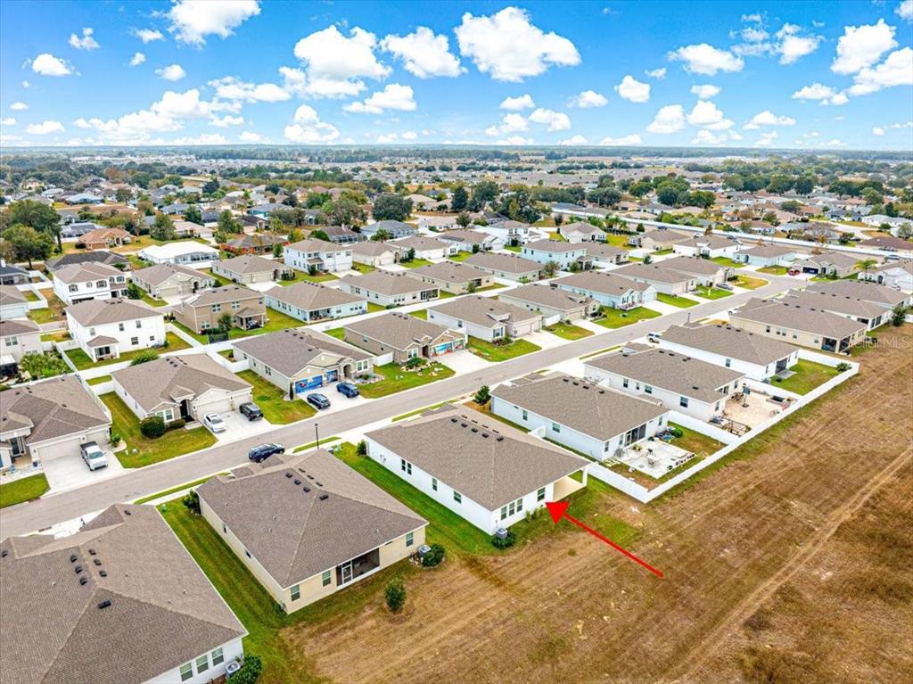 5851 Southwest 85th Place Ocala, FL 34476 - Photo 57 of 57 an aerial view of residential houses with outdoor space