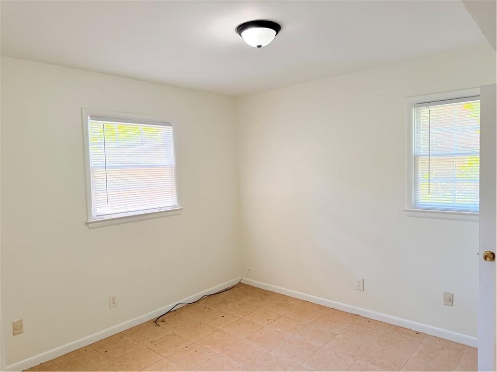 3460 Boring Road Decatur, GA 30034 - Photo 7 of 16 an empty room with a window