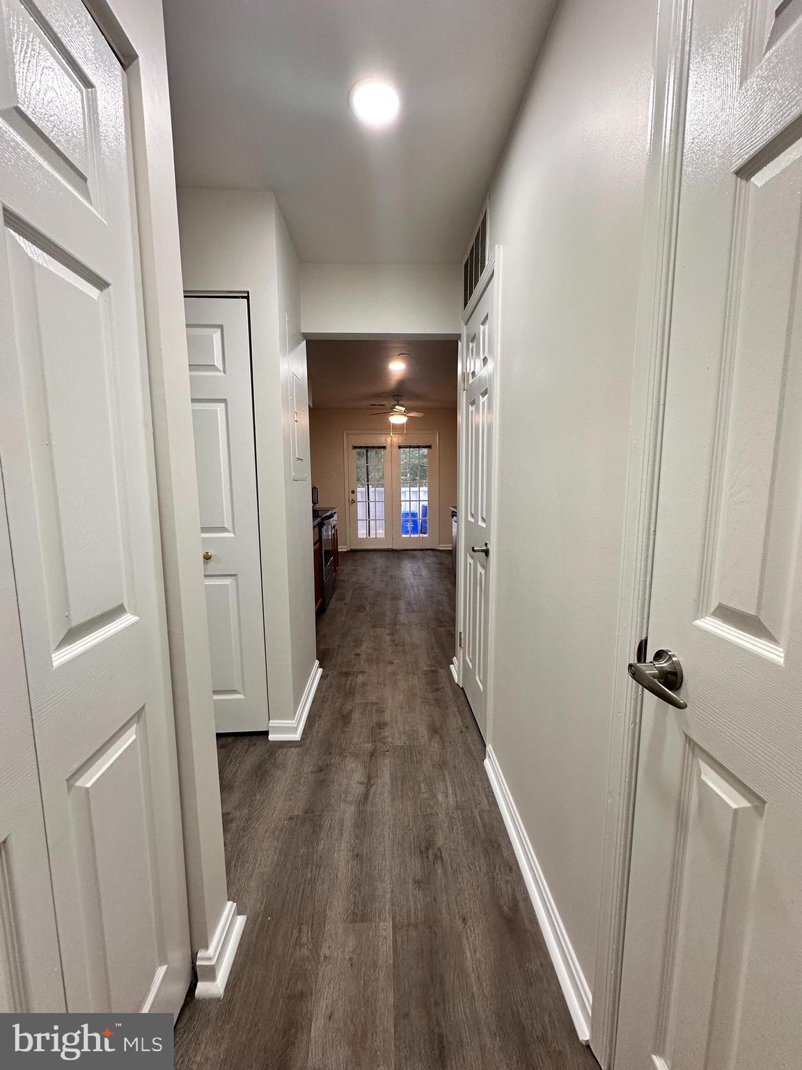 31 Amarillo Court, Unit 113 Germantown, MD 20874 - Photo 11 of 24 a view of a hallway with wooden floor