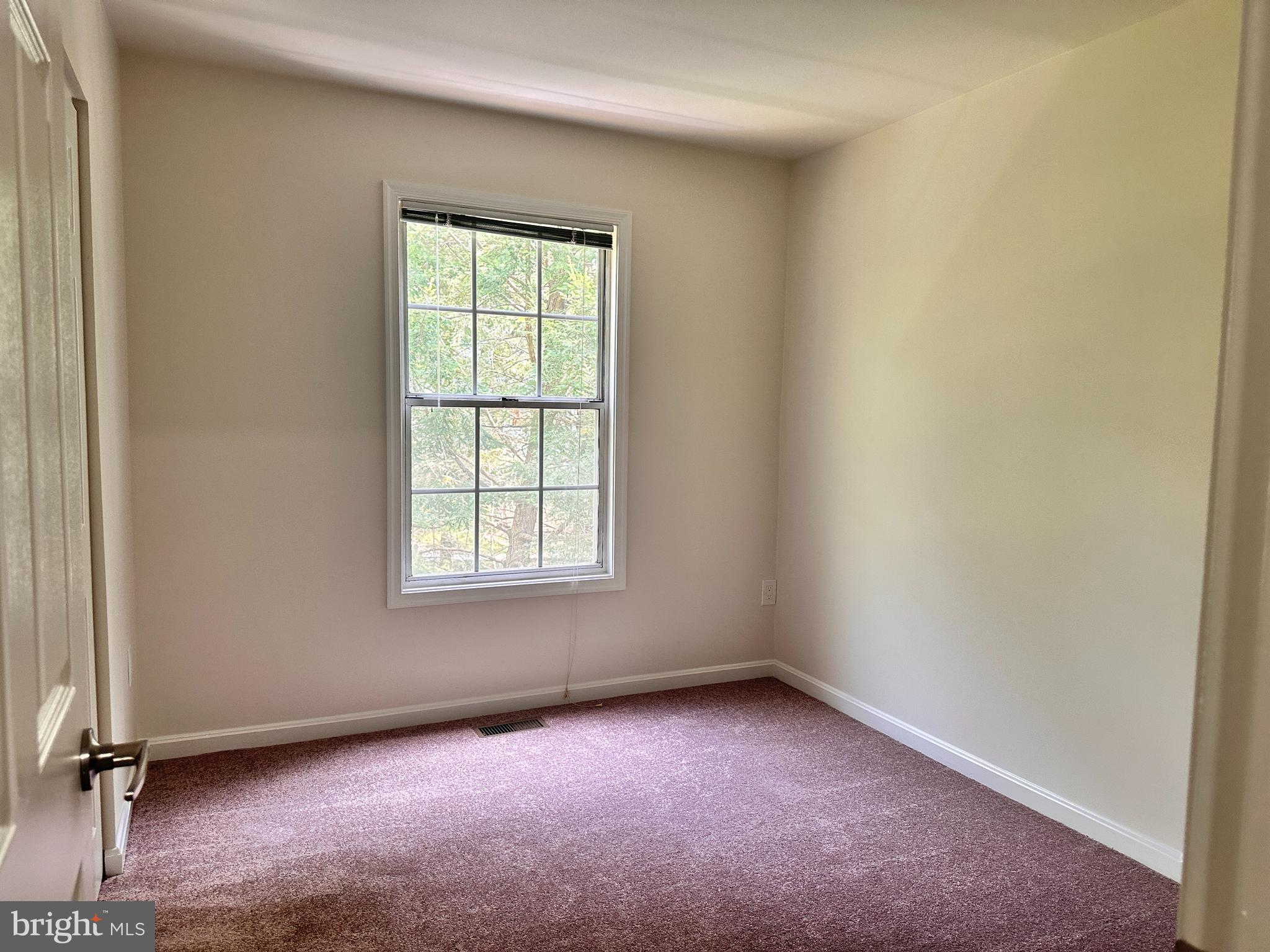 31 Amarillo Court, Unit 113 Germantown, MD 20874 - Photo 17 of 24 an empty room with a window