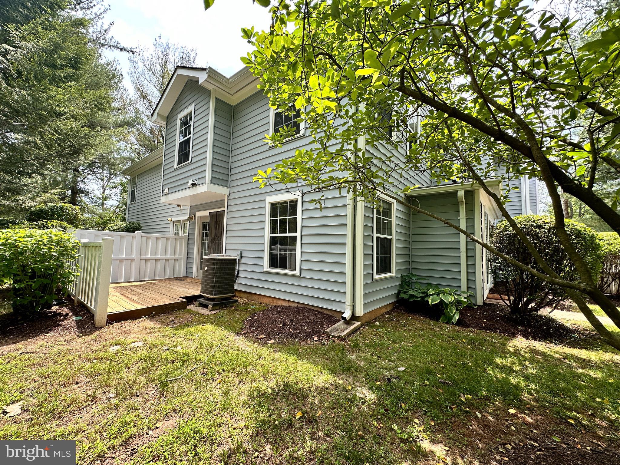 31 Amarillo Court, Unit 113 Germantown, MD 20874 - Photo 3 of 24 a view of a house with a yard